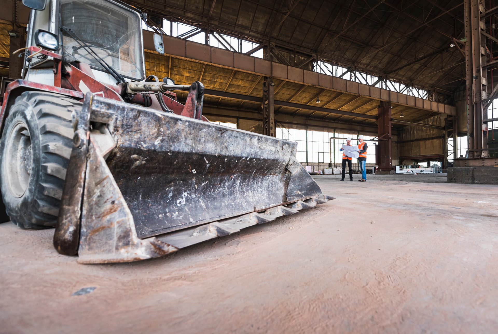 Construction workers reviewing safety plans